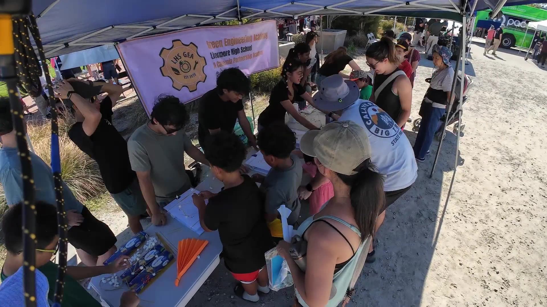GEA students helping visitors explore science at the academy’s Stockmens Park booth